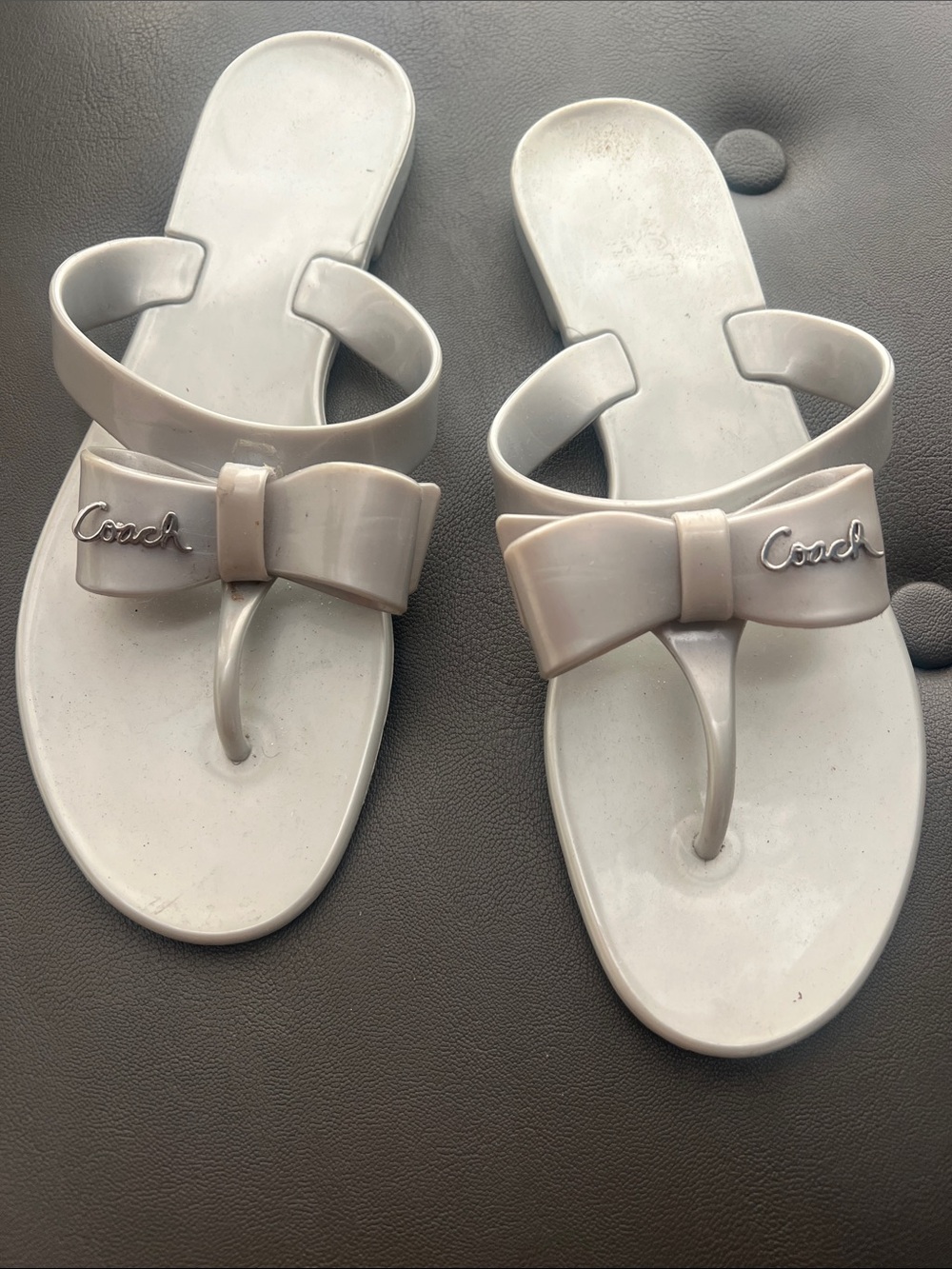 Coach Women’s Bow Toe-Thong Sandals in Light grey